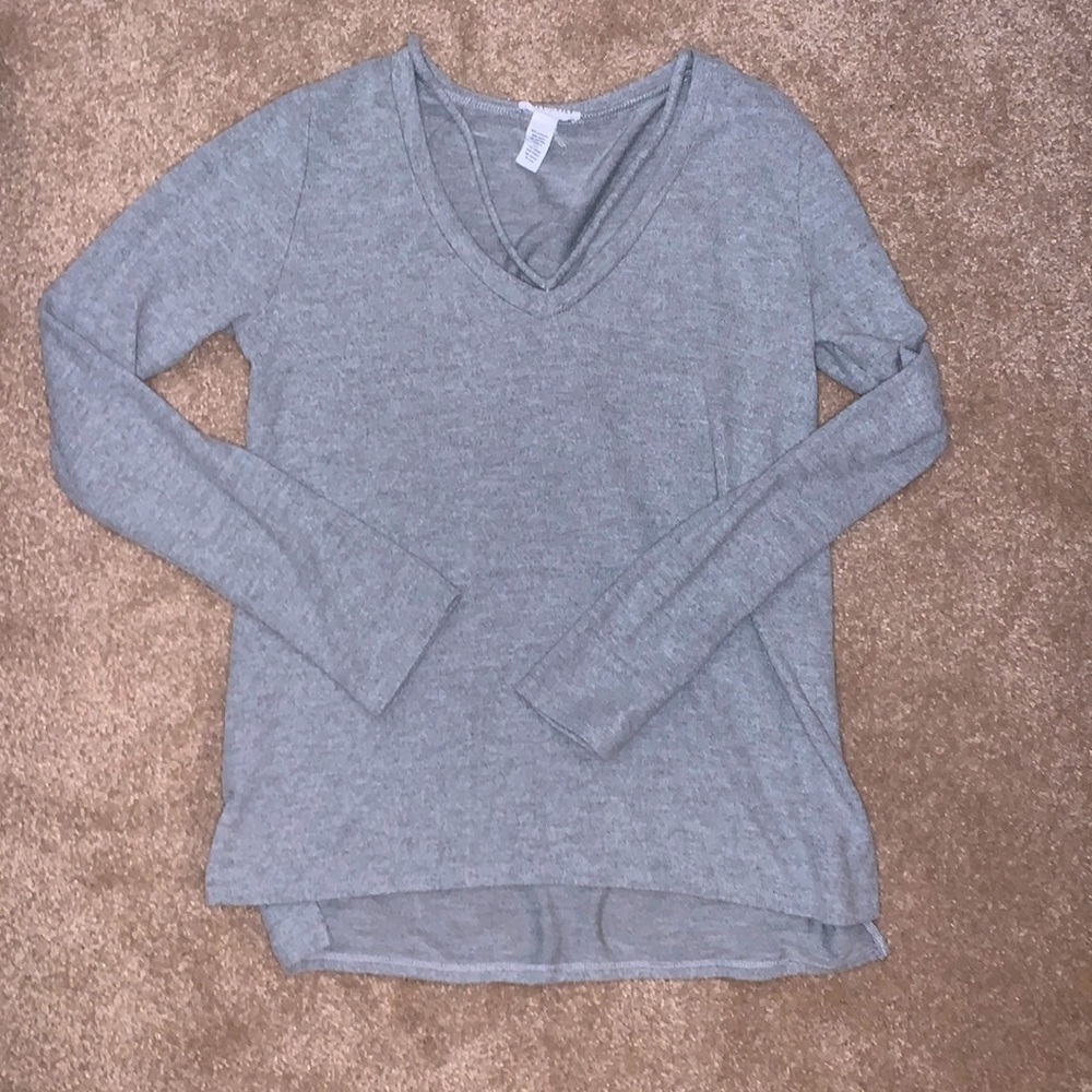 Grey long sleeve sweater with front straps